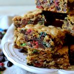 These Thick & Chewy Monster Cookie Bars taste just like your favorite monster cookie recipe but EASIER! Loaded with chewy oats, creamy peanut butter, gooey chocolate chips and crunchy mini M&M's, they're flavorful, thick, super chewy, and DELICIOUS!
