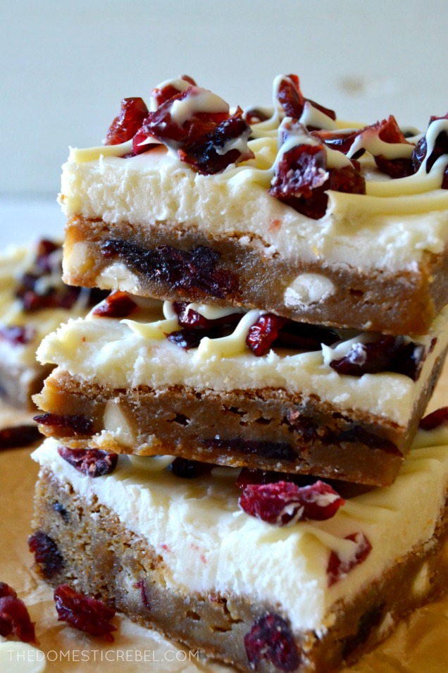 three cranberry bliss bars stacked 