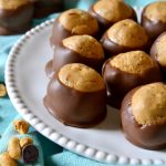 Everyone will go CRAZY for these BEST-EVER Peanut Butter Buckeye Truffles! They're the easiest candy to make with only a few simple ingredients, but they taste AMAZING. Creamy, buttery, soft and almost gooey with a smooth chocolate outer shell. Perfect for anytime but especially gift-giving!