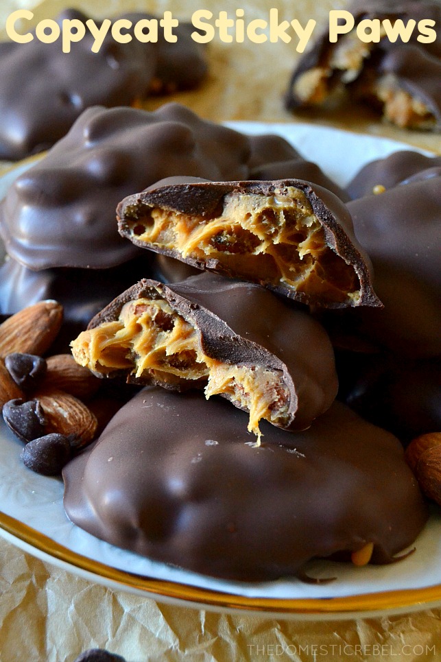 These COPYCAT STICKY PAWS taste even BETTER than Williams Sonoma's holiday version! Made with buttery caramel, nutty almonds and creamy milk chocolate, they're an easy, quick candy recipe you'll LOVE making year-round! 