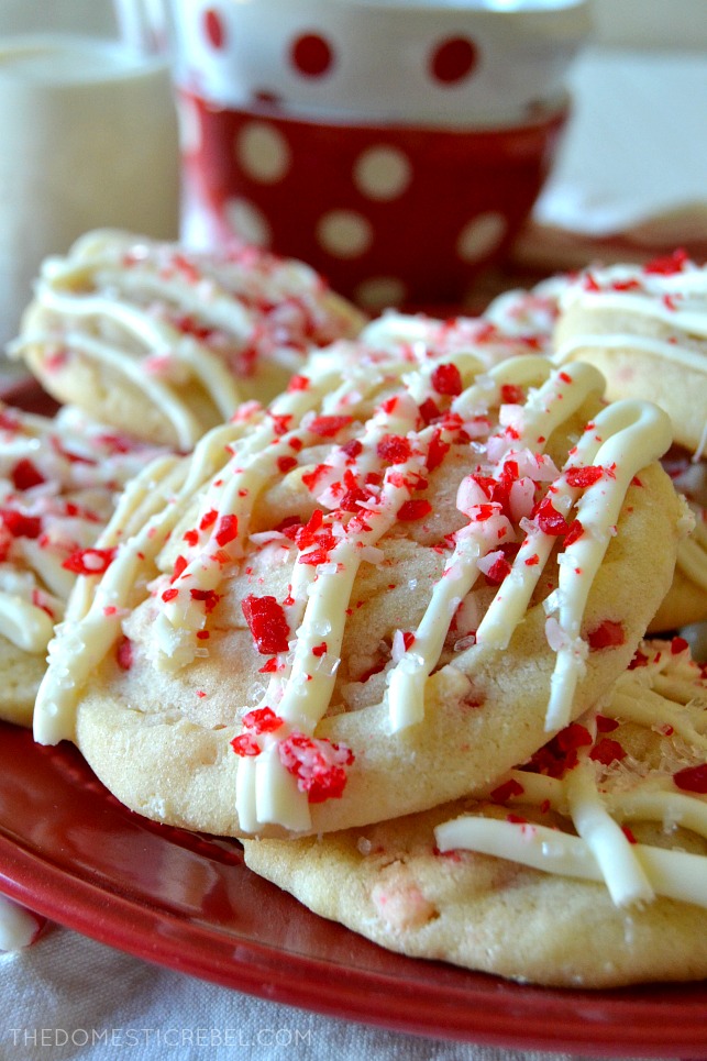 peppermint sugar cookie piled up on a red plate 