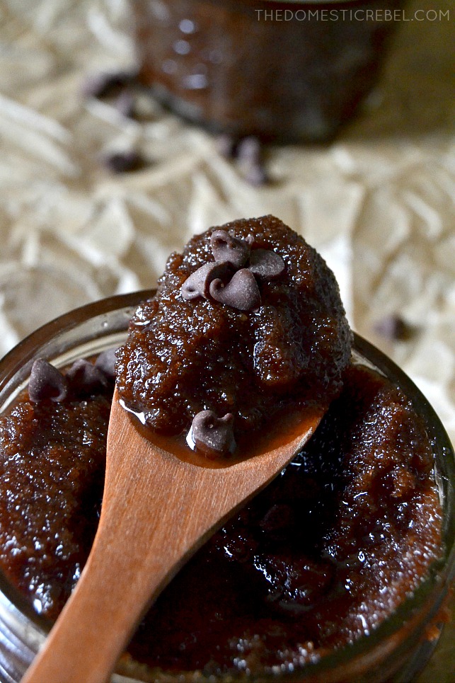 a spoonful of chocolate sugar scrub with miniature chocolate chips 