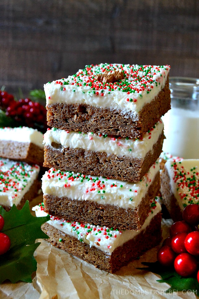 These Gingerbread Blondies with Cream Cheese Frosting are perfect for the holidays! Soft, chewy, perfectly spiced blondies are topped with a smooth and fluffy cream cheese icing and are decorated adorably for the holidays! Easy and feeds a crowd! 