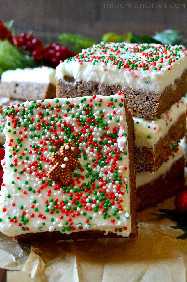 one gingerbread blondie propped up against three stacked blondies 