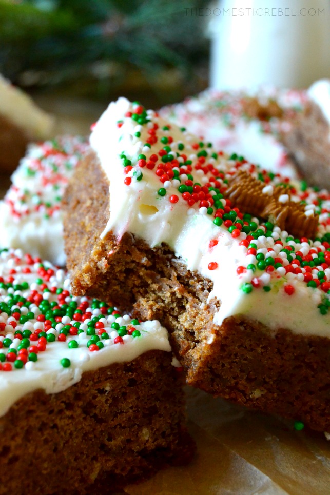 These Gingerbread Blondies with Cream Cheese Frosting are perfect for the holidays! Soft, chewy, perfectly spiced blondies are topped with a smooth and fluffy cream cheese icing and are decorated adorably for the holidays! Easy and feeds a crowd! 