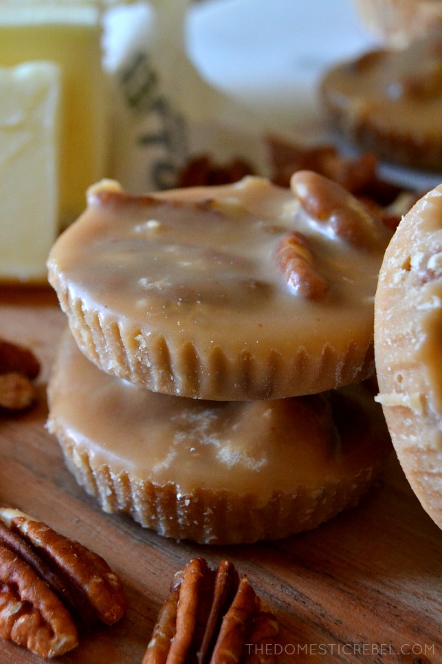 two pecan pralines stacked on top of each other