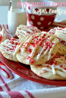 These Peppermint Crunch Sugar Cookies are perfect for the holidays! Buttery, soft, tender sugar cookies flavored with crunchy peppermint chips, creamy white chocolate, and candy cane sprinkles! Crunchy, fluffy, minty goodness!