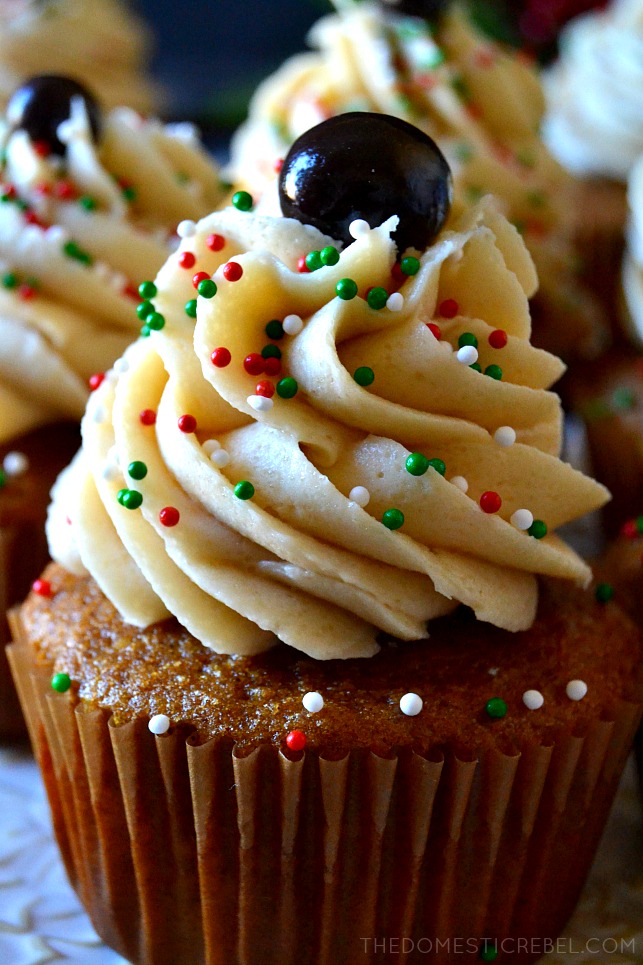 close up of one gingerbread latte cupcake iced with christmas colored sprinkles