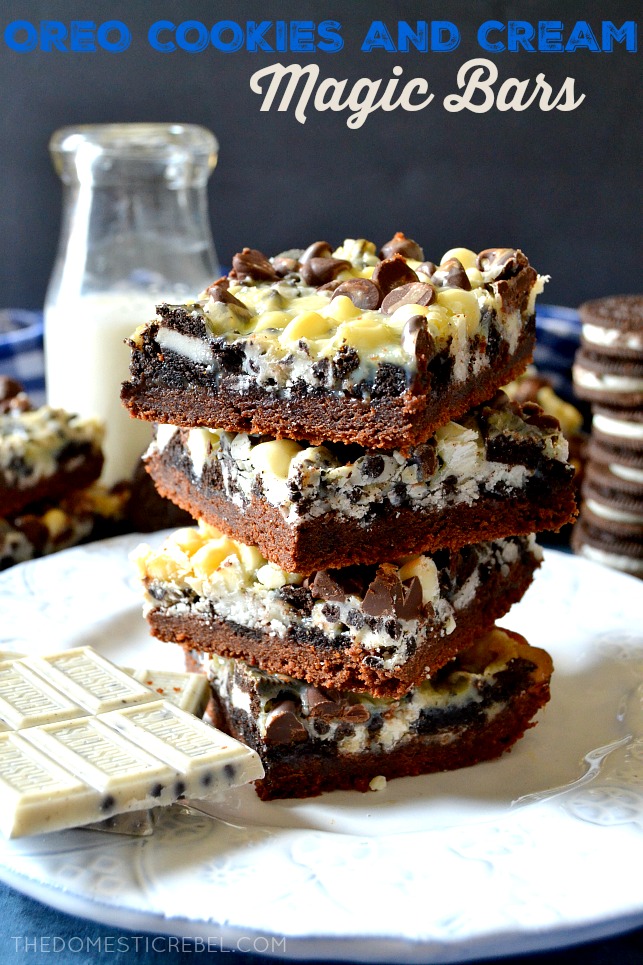 oreo cookies and cream magic bars stacked on white plate with chocolate