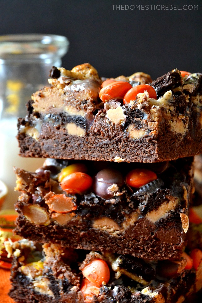 close up of three peanut butter magic bars stacked on top of each other