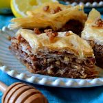 This Best Ever Baklava recipe is so easy! Yes, it can be laborious but be patient and you'll be rewarded with crispy, crunchy, gooey, and sticky baklava bursting with honey syrup, flaky phyllo, and spiced nuts!