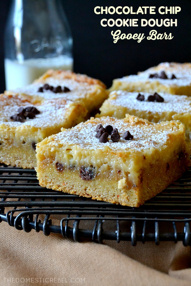 chocolate chip cookie dough gooey bars arranged on a wire cooling rack 
