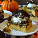 These Oreo Pumpkin Cheesecake Bars are heavenly! Silky smooth, perfectly spiced, creamy pumpkin cheesecake filled with crunchy, chocolate Oreo cookie pieces on a buttery shortbread crust. Whipped cream is mandatory for these crowd-pleasing, super simple bars!
