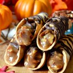 Need a show-stopping dessert? These Pecan Pie Cannoli are IT! Crispy, flaky cannoli shells are filled to the brim with gooey, sticky, sweet, homemade from scratch pecan pie filling! Such a fun twist on two classic desserts for one unique dessert mashup!