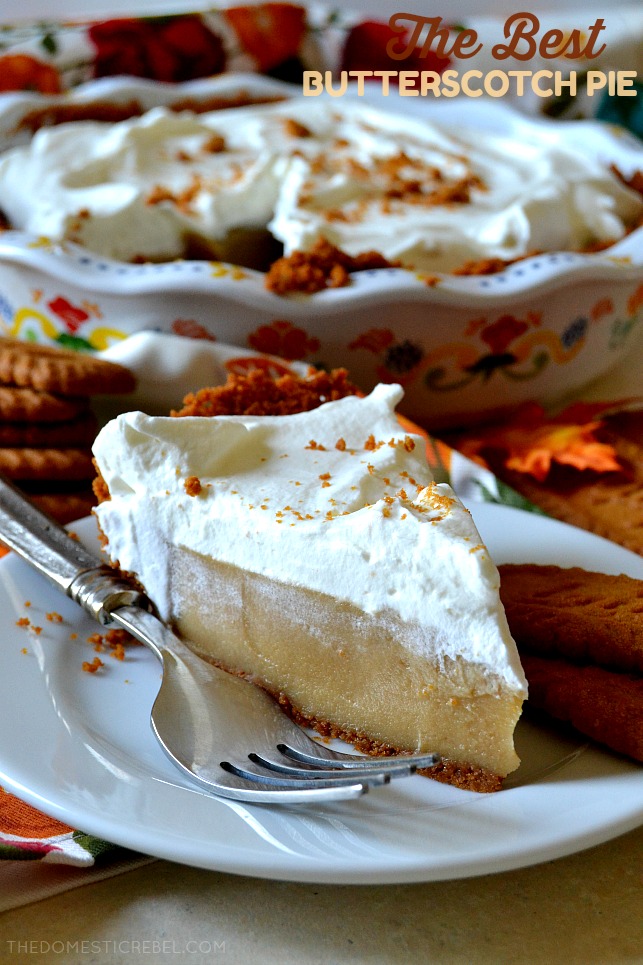 Slice of butterscotch pudding pie on a white plate next to a silver fork