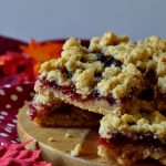 These Cranberry Crumble Bars combine a thick, buttery, oatmeal and brown sugar base and streusel that's filled with tart, tangy and sweet cranberry filling! Soft and chewy, they're great for using up leftover cranberry sauce and they come together in a jiffy!
