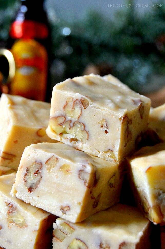 Close-up of a stack of pieces of Kahlua fudge in front of a green background
