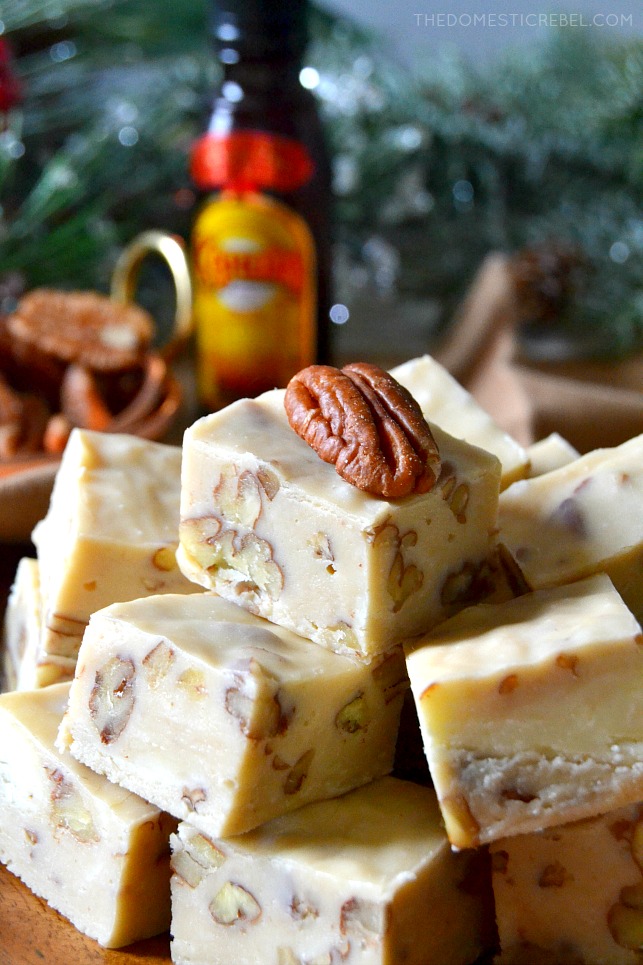 Close-up of a stack of Kahlua fudge pieces with a pecan on top