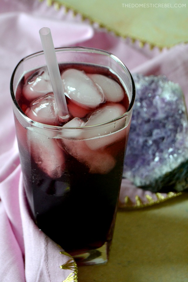 This Boozy Grape Kombucha Kool-Aid is a fun grown-up drink that tastes just like grape punch but made with fizzy, sparkling kombucha! Sweet, fruity, with a hint of tart tangy-ness from the kombucha, it perfectly represents Aquarius in my Zodiac Cocktail series! 