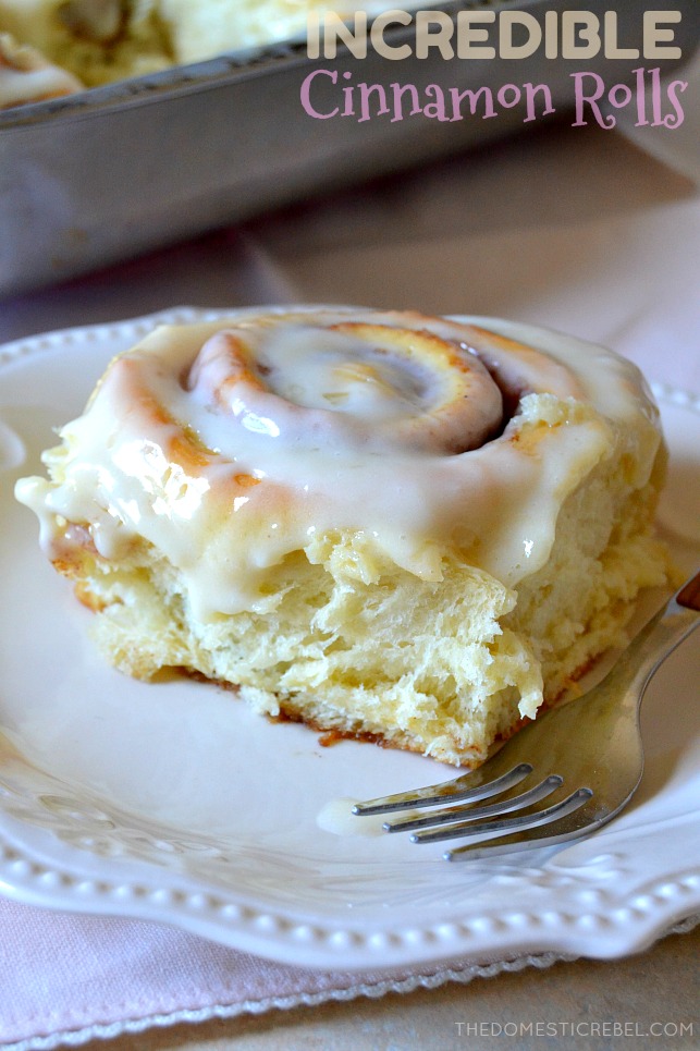 incredible cinnamon rolls on white plate with fork