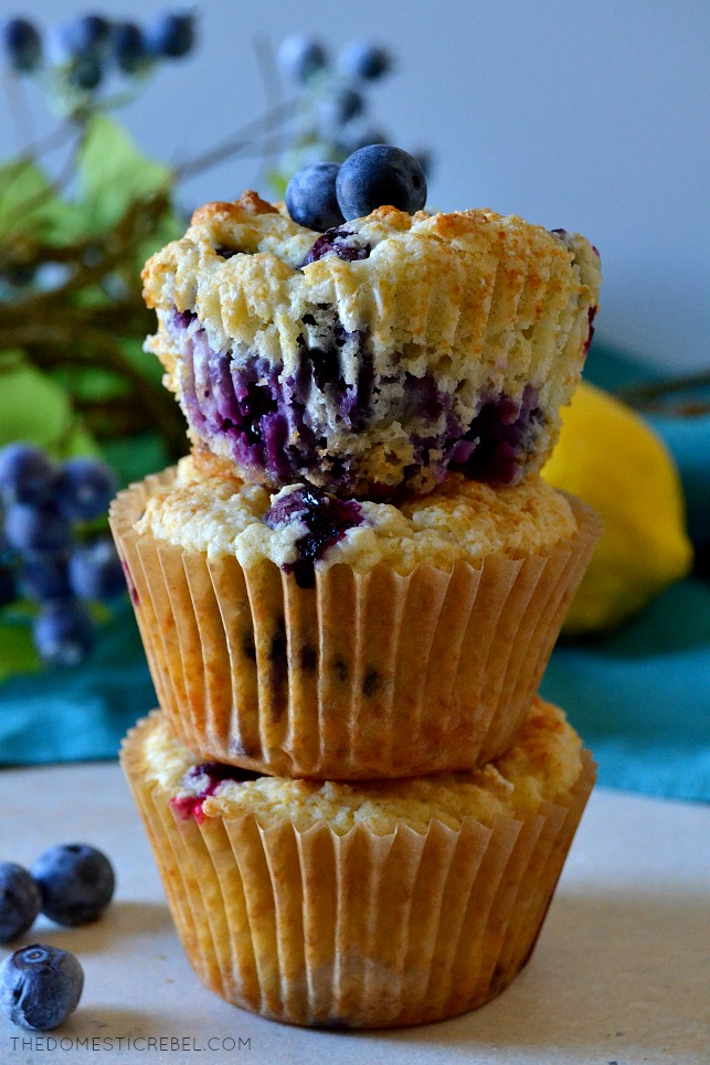 These Healthier Blueberry Muffins are low-cal, low-sugar and low-fat but HIGH on flavor! Supremely moist and tender, they're packed with juicy pockets of fresh blueberries in every bite! No one will know these indulgent muffins are lighter! 