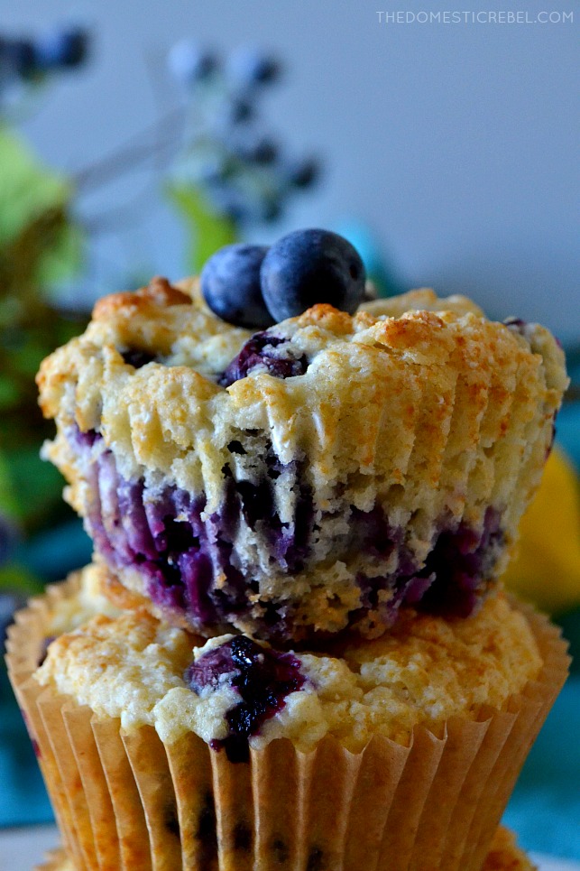 These Healthier Blueberry Muffins are low-cal, low-sugar and low-fat but HIGH on flavor! Supremely moist and tender, they're packed with juicy pockets of fresh blueberries in every bite! No one will know these indulgent muffins are lighter! 
