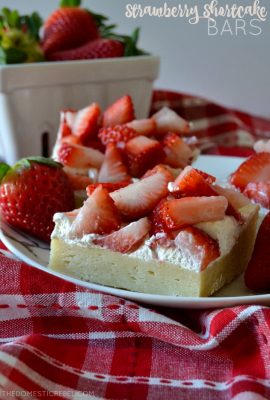 These Strawberry Shortcake Bars are soft, chewy and cakey cookie bars loaded with a light cream cheese whipped frosting and tons of fresh strawberries! Use any kind of fruit you'd like for these sweet, refreshing bars that feed a crowd!
