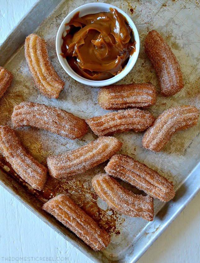 These Perfect & Easy Homemade Churros are light and crispy with soft, fluffy interiors and an amazing cinnamon sugar flavor! You won't believe how simple these are to make, too! Perfect for Mexican food night, Cinco de Mayo or parties! 