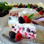This No-Bake Berry Mousse Pie is absolutely delicious and simple, too! Light, fluffy and sweet berry and zesty lemon mousse filling in a buttery shortbread crust and topped with fresh whipped cream! You'll love this dreamy, no-bake pie!