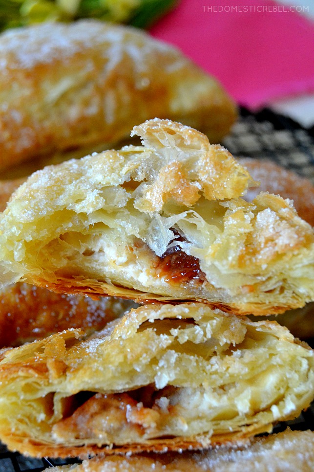 These Puerto Rican Guava & Cream Cheese Quesitos are like flaky cheese danish pastries but made with tart, tangy guava paste and sweetened cream cheese in every sugary bite! You'll love these easy, fast pastries for breakfast, brunch, or dessert! 
