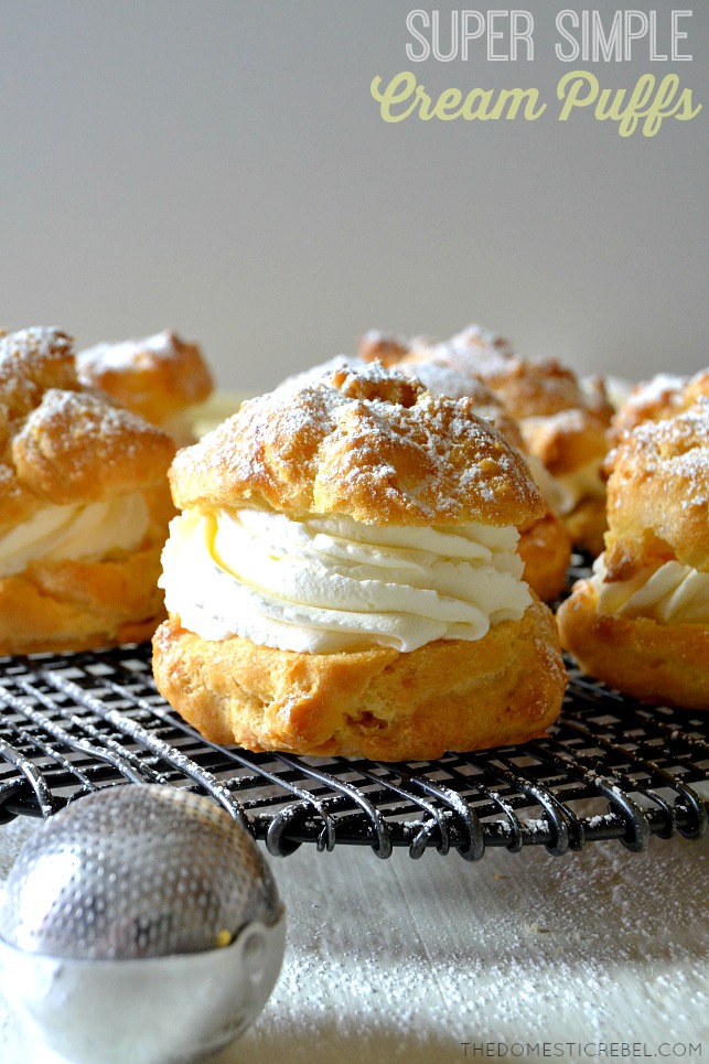simple cream puffs on wire rack with dusting wand