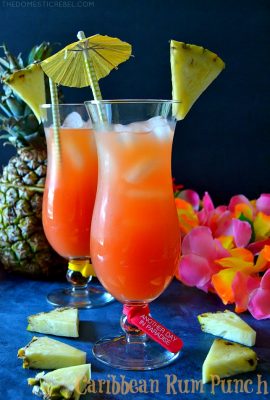 This Caribbean Rum Punch is easy and comes together in literal seconds, and it tastes AMAZING! Made with fruit juices and three kinds of rum, it's perfect for parties because it can be easily doubled or tripled! Refreshing, sweet and totally delicious!