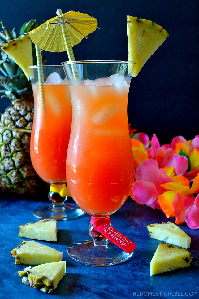 This Caribbean Rum Punch is easy and comes together in literal seconds, and it tastes AMAZING! Made with fruit juices and three kinds of rum, it's perfect for parties because it can be easily doubled or tripled! Refreshing, sweet and totally delicious! 