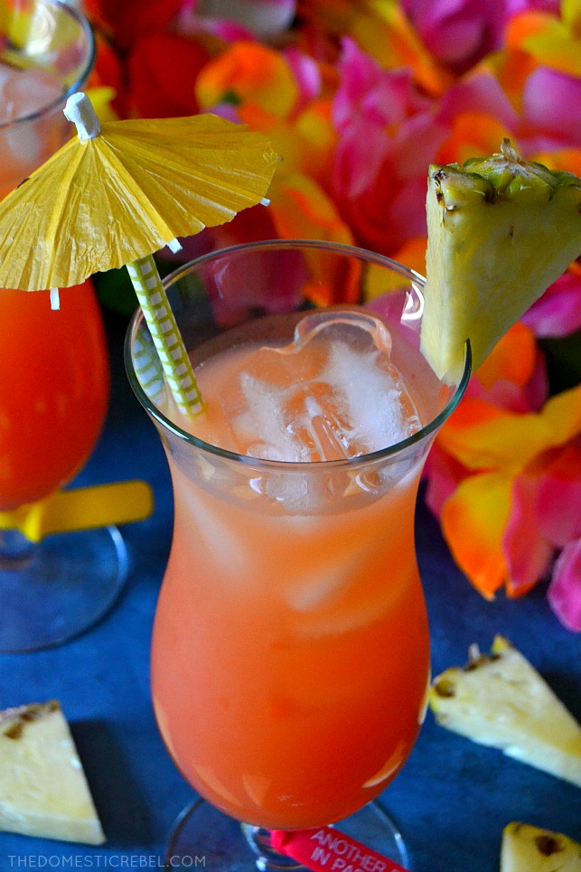 This Caribbean Rum Punch is easy and comes together in literal seconds, and it tastes AMAZING! Made with fruit juices and three kinds of rum, it's perfect for parties because it can be easily doubled or tripled! Refreshing, sweet and totally delicious! 