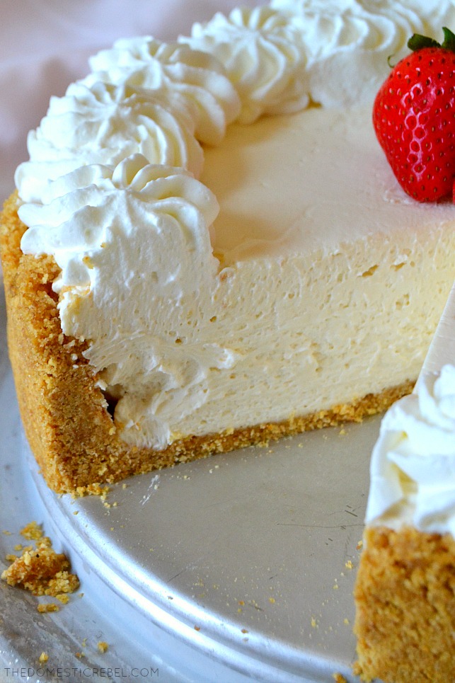 This No-Bake Cheesecake is the BEST EVER! Super rich, smooth, creamy and fluffy, it tastes like authentic New York cheesecake but in a dreamy no-bake version! Comes together pretty quickly, can be made ahead and great for serving a crowd! The perfect no-bake dessert!