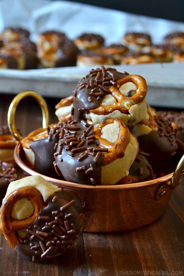 These Cookie Dough Pretzel Bites are back from the archives and better than ever! Crunchy, creamy, sweet & salty pretzel bites filled with edible, egg-free and safe-to-eat chocolate chip cookie dough for the perfectly addictive, irresistible chocolate craving! You'll love these no-bake wonders!