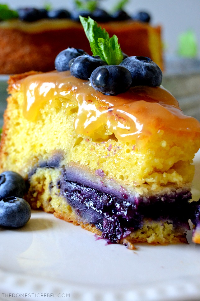 This Lemon Blueberry Piecaken is out of this world AMAZING and so EASY to make! A moist lemon cake is stuffed with an ENTIRE juicy, gooey blueberry pie for an impressive dessert everyone will adore! 