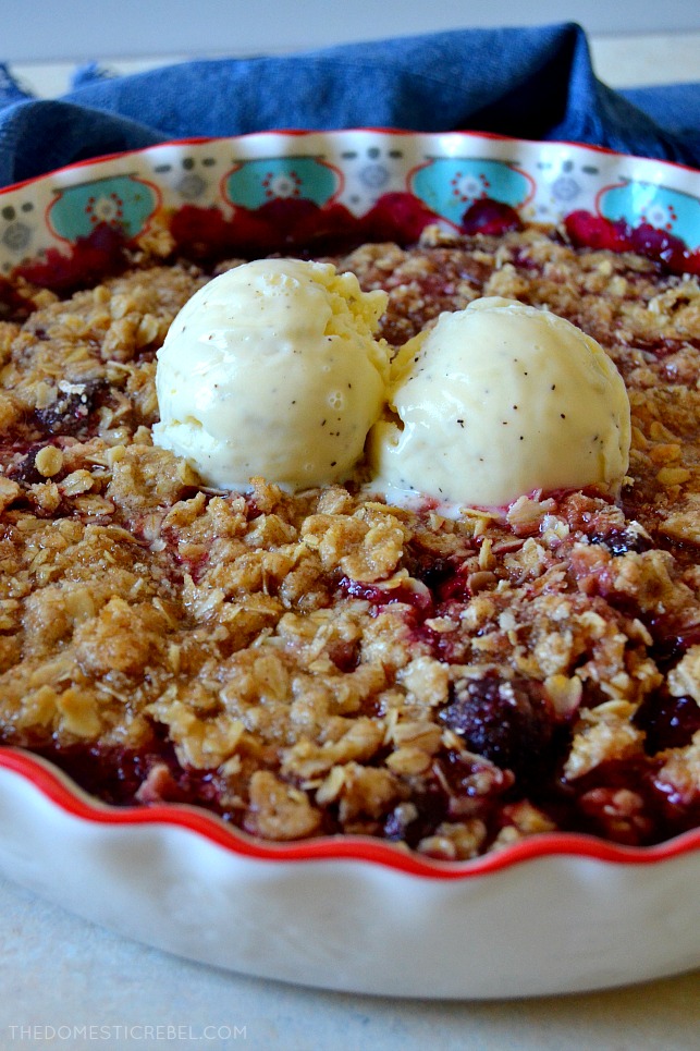 This Super Easy CHERRY CRISP will be the hit of all your summertime soirees! Fresh, juicy, dark Washington cherries baked with a buttery, spiced oat crisp topping for a delicious and simple dessert! Don't forget the ice cream! 