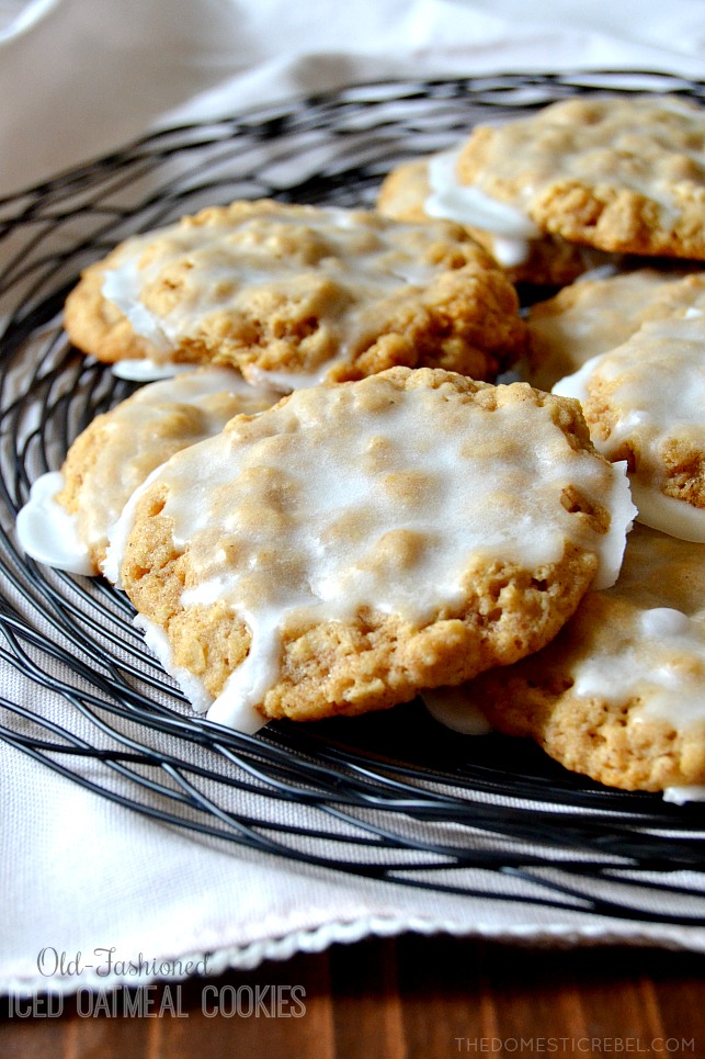 old-fashioned iced oatmeal cookies arranged in pile on wire rack
