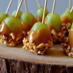These Caramel Apple Grapes are sweet, salty, juicy, creamy, and crunchy all in one! Super easy, only a few ingredients and are so addictive and delicious! Perfect for parties as a great little snack!
