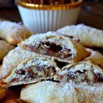 These Air-Fryer Pecan Hand Pies are absolutely irresistible and so easy! Made in either the air-fryer or the oven, these two-bite pies are buttery, flaky and filled with DELICIOUS gooey pecan pie filling! Such a great shortcut for the busy holiday seasons!