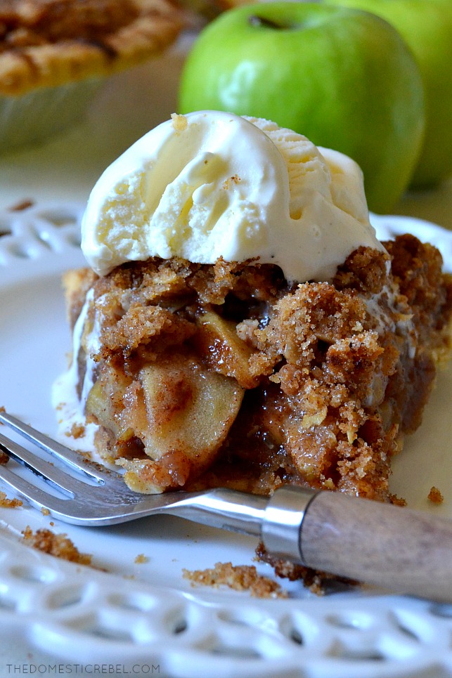 This Apple Crisp Pie is a unique combination between deep-dish apple pie and apple crisp. two fall favorite desserts! Deep dish, gooey apple pie topped with a buttery, crumbly crisp topping in every bite! You'll love this dessert mashup! 