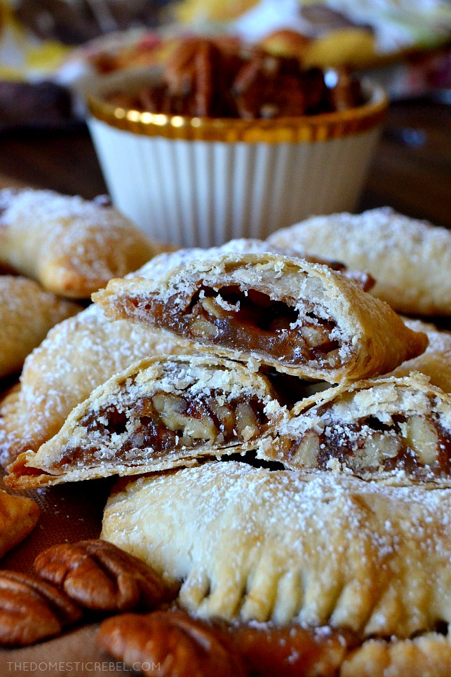 These Air-Fryer Pecan Hand Pies are absolutely irresistible and so easy! Made in either the air-fryer or the oven, these two-bite pies are buttery, flaky and filled with DELICIOUS gooey pecan pie filling! Such a great shortcut for the busy holiday seasons! 