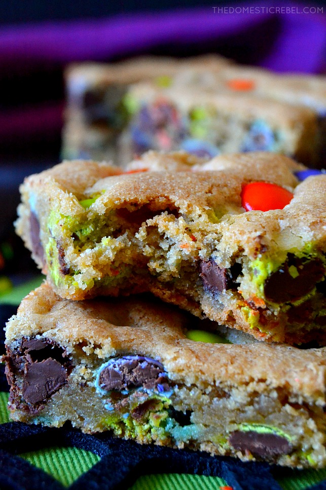 These Halloween M&M Cookie Bars are like deep dish chocolate chip cookies! Soft, chewy, buttery and chocolaty with festive Halloween M&M's candies and lots of flavor! Great for feeding a crowd! 