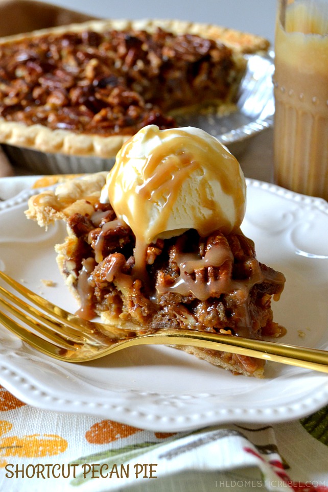 shortcut pecan pie slice on white plate with gold fork