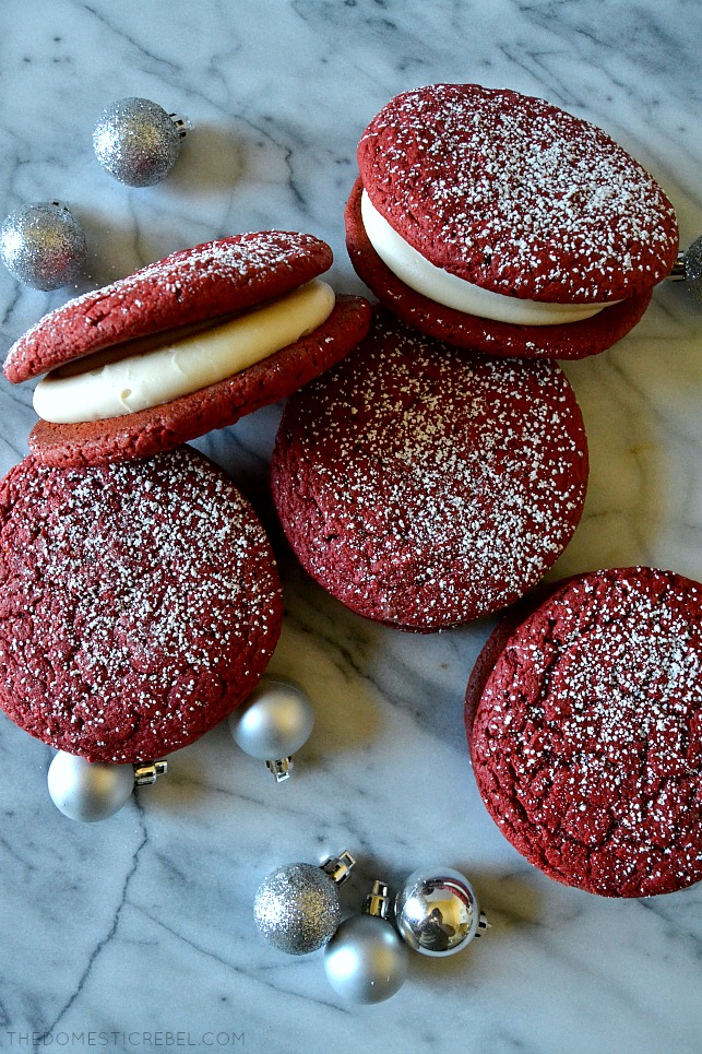 These Red Velvet Whoopie Pies are a must make any time of year! Pillowy soft and chewy, rich red velvet "cookies" sandwiched around sweet and tangy cream cheese frosting for the ultimate Southern-inspired sweet treat! 