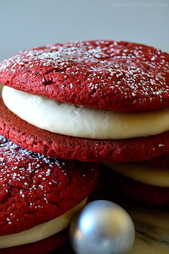 These Red Velvet Whoopie Pies are a must make any time of year! Pillowy soft and chewy, rich red velvet "cookies" sandwiched around sweet and tangy cream cheese frosting for the ultimate Southern-inspired sweet treat! 
