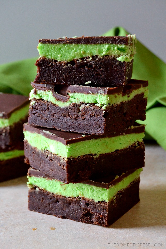 stack of mint chocolate brownies on wood board