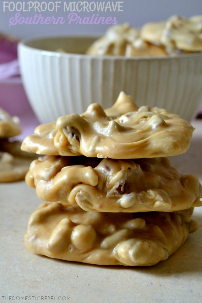 microwave southern pralines stacked on light wood with white bowl in background