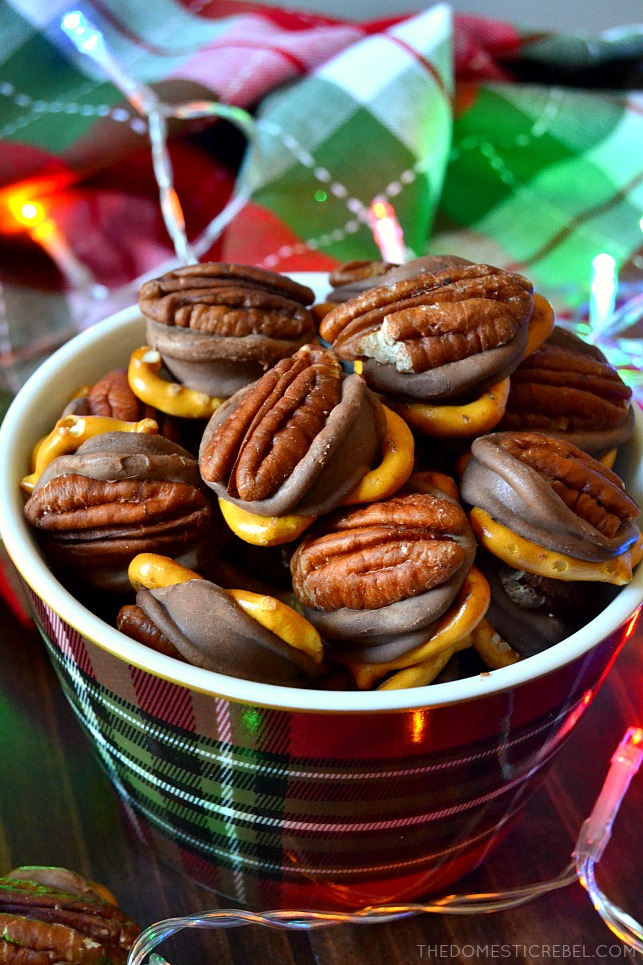 pretzel turtle candies piled in plaid bowl with xmas lights